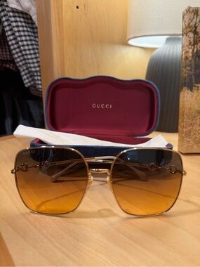 Gucci Gold Frame Sunglasses with Brown Gradient Lenses